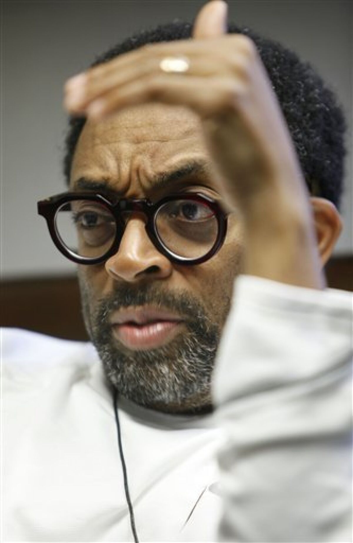 In this June 15, 2009 photo, film director Spike Lee responds during an interview in New York about his 1989 film "Do The Right Thing." (AP Photo/Seth Wenig)