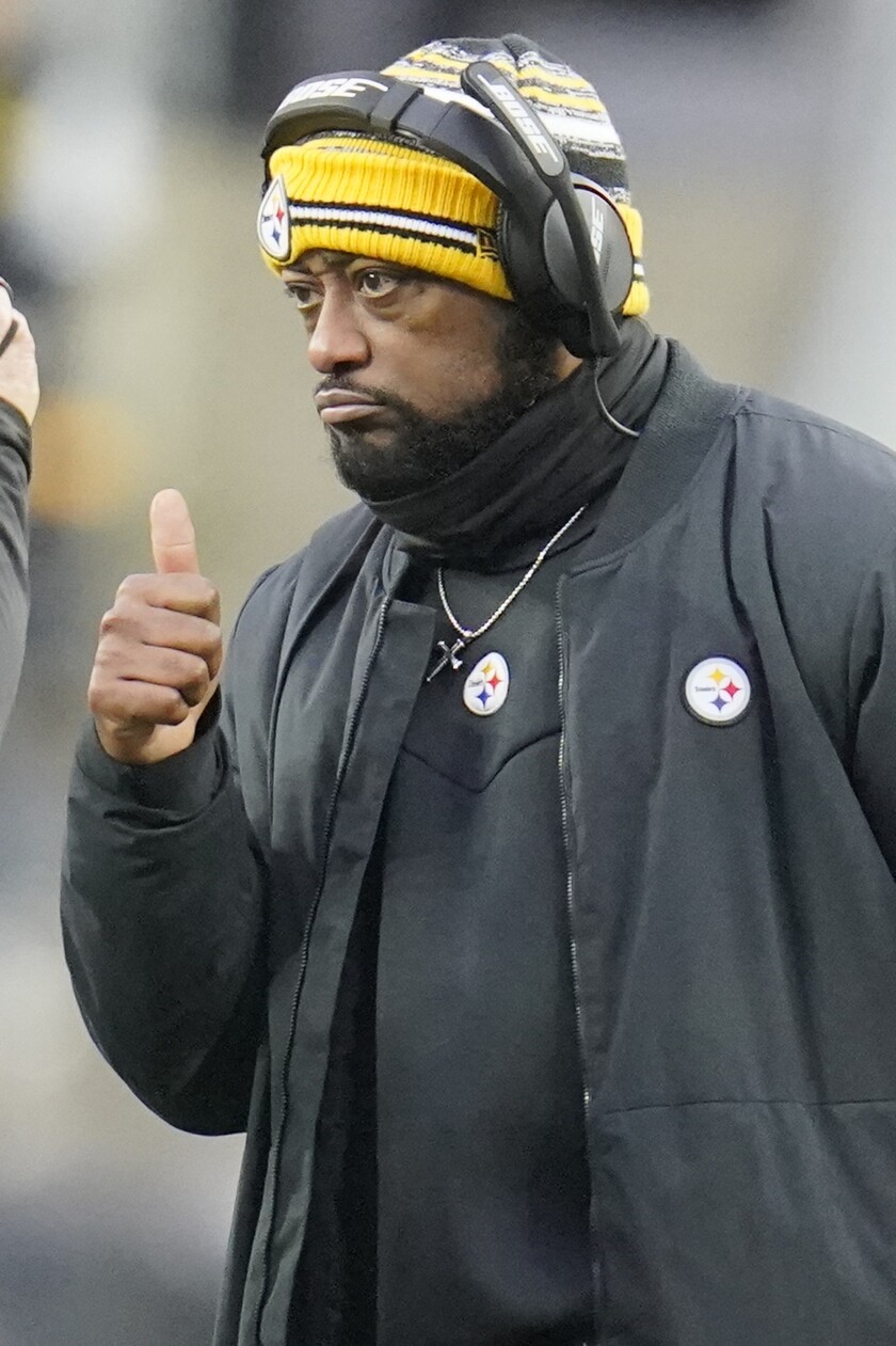 Pittsburgh Steelers head coach Mike Tomlin gives a thumbs-up as his team plays against the Tennessee Titans during the second half of an NFL football game, Sunday, Dec. 19, 2021, in Pittsburgh. (AP Photo/Gene J. Puskar)