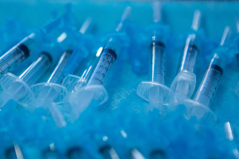 LOS ANGELES, CA - FEBRUARY 11: A tray of filled syringes with filled COVID-19 vaccine at Kedren Health on Thursday, Feb. 11, 2021 in Los Angeles, CA. (Jason Armond / Los Angeles Times)