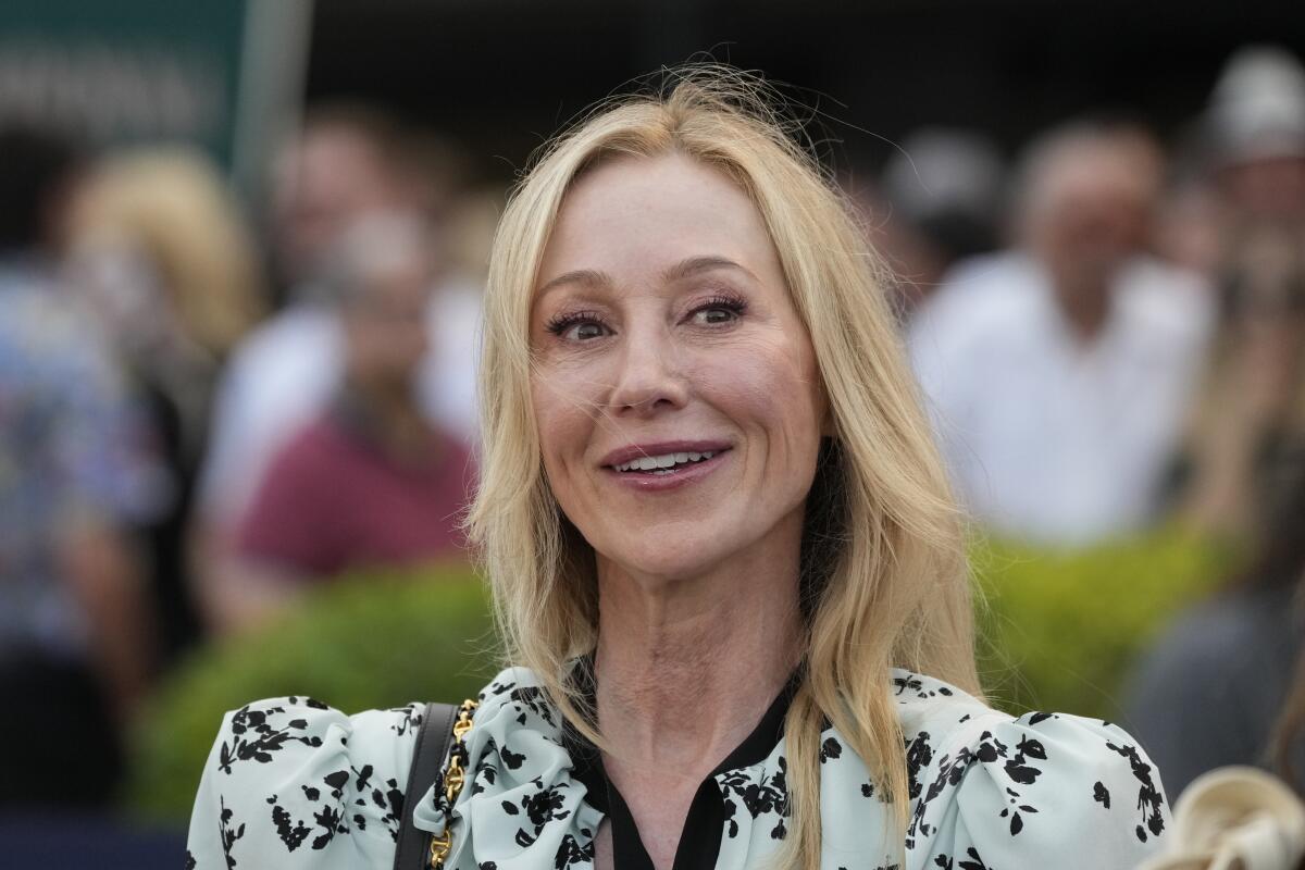 Belinda Stronach looks on before the start of the $3 million Pegasus World Cup Invitational on dirt horse race, Jan. 27, 2024, at Gulfstream Park in Hallandale Beach, Fla. Stronach is calling on the racing world to do more to make the sport safer and that goes for how retired horses are treated as well. She's the chairwoman of 1/ST (pronounced first) Racing, the group that operates Gulfstream Park and other tracks like Santa Anita (AP Photo/Wilfredo Lee)