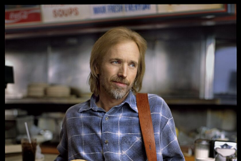 Promotional portrait of Tom Petty for his beloved 1994 solo album "Wildflowers" which is being reissued.