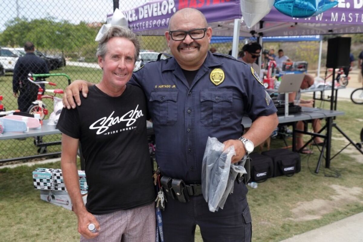 Billy Ruff with Sgt. Sal Hurtago at the 2021 Skate Jam.