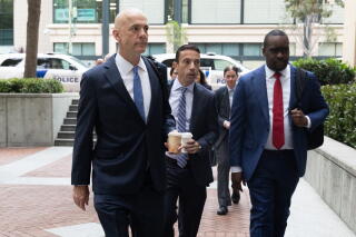 Meta's defense attorney Paul Schmidt (L) arrives to court