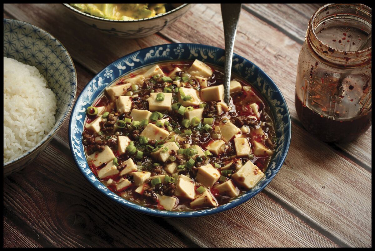 This image shows a recipe for Japanese-Style Mapo Tofu from the cookbook "The Wok: Recipies and Techniques," by J. Kenji López-Alt. (J. Kenji López-Alt/W. W. Norton & Company via AP)
