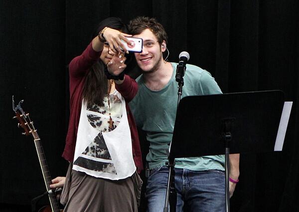 "American Idol" Season 11 winner Phillip Phillips and runner-up Jessica Sanchez take a photo together during a rehearsal for the "American Idol" Live 2012 tour.