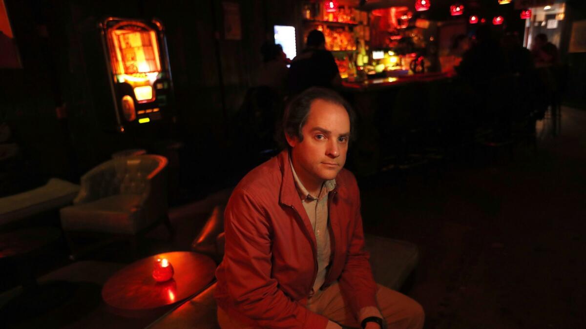 Aaron Katz, writer/director of the L.A.-set crime drama "Gemini," is photographed inside the Tonga Hut in North Hollywood on March 22.