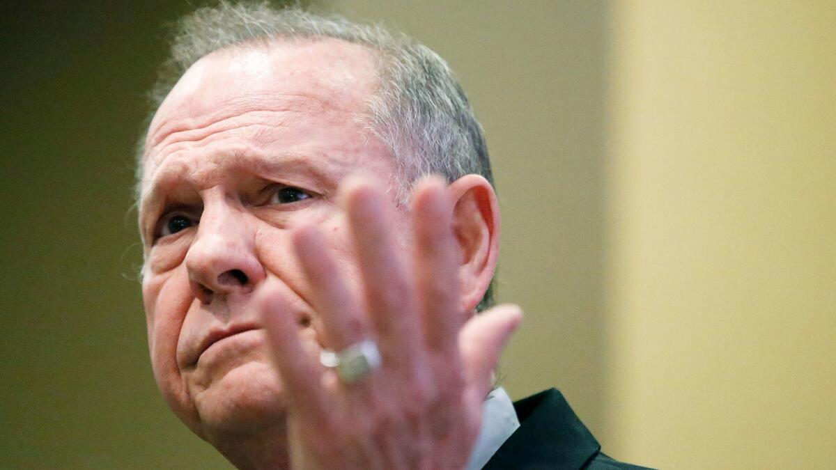 Former Alabama Chief Justice and U.S. Senate candidate Roy Moore speaks at the Vestavia Hills Public library on Nov. 11 in Birmingham, Ala.