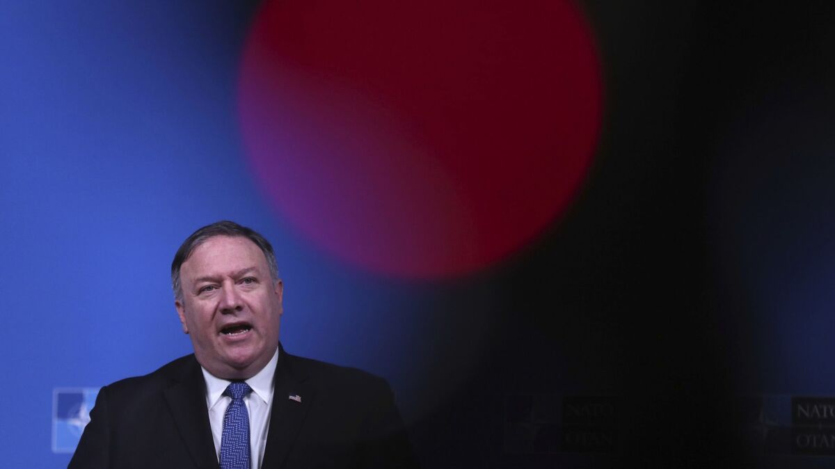 Secretary of State Mike Pompeo speaks during a media conference after a meeting of foreign ministers at the NATO headquarters in Brussels, Belgium on Dec. 4.