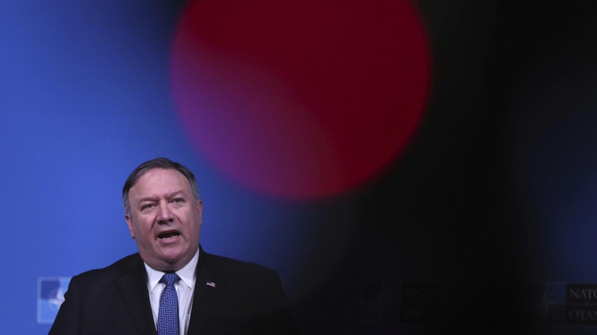 Secretary of State Mike Pompeo speaks during a media conference after a meeting of foreign ministers at the NATO headquarters in Brussels, Belgium on Dec. 4.