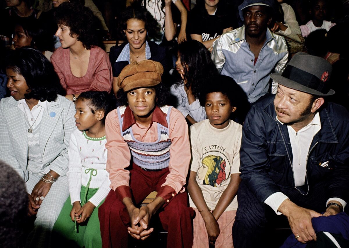 Motown company basketball game: Katherine, Janet, Michael and Randy Jackson with Billy Bray, Los Angeles 1974. Shot by Bruce W. Talamon.