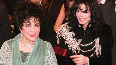 Elizabeth Taylor with Michael Jackson at her 1987 birthday celebration at the Pantages Theater in Los Angeles.