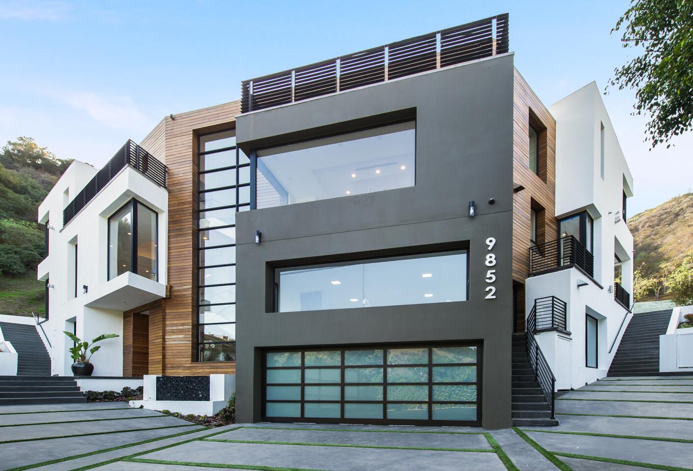 The modular home rises three stories.