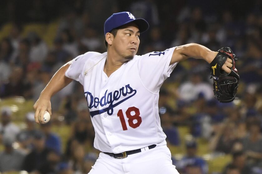 LOS ANGELES, CA - SEPTEMBER 21: Kenta Maeda #18 of the Los Angeles Dodgers was brought in to face two batters in the ninth inning against the Colorado Rockies at Dodger Stadium on September 21, 2019 in Los Angeles, California. (Photo by John McCoy/Getty Images)