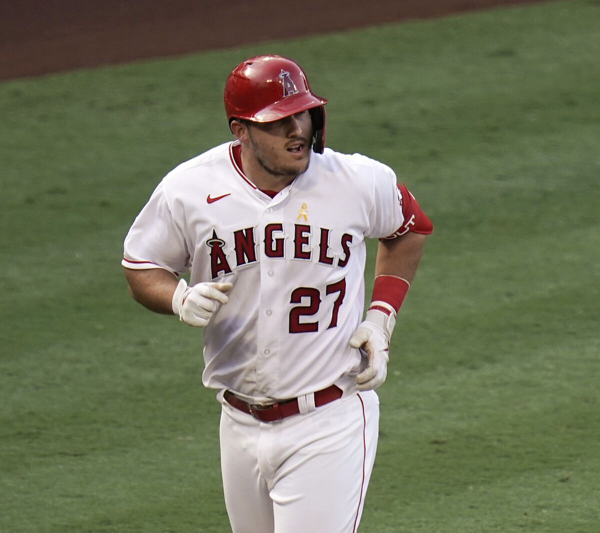 The Angels' Mike Trout rounds the bases after homering during the third inning Sept. 5, 2020.