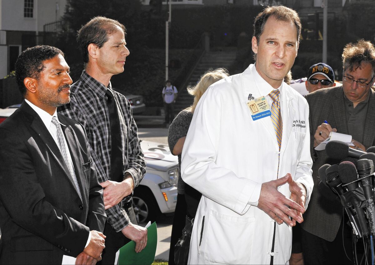 Dr. Zachary Rubin, right, of UCLA’s Ronald Reagan Medical Center, at news conference in February. Rubin testified at Thursday's FDA hearing.