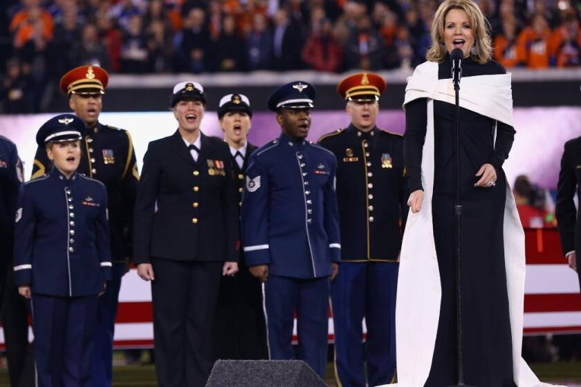 Renee Fleming signs the national anthem during Super Bowl XLVIII at MetLife Stadium in New Jersey.