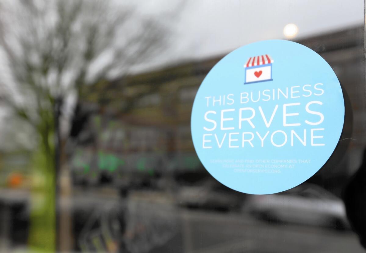 A window sticker on a downtown Indianapolis business on March 25 shows its objection to Indiana's religious freedom bill.