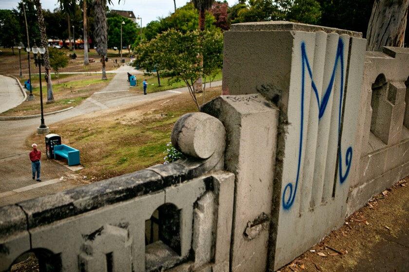 Gang-related graffiti mark territory in MacArthur Park.