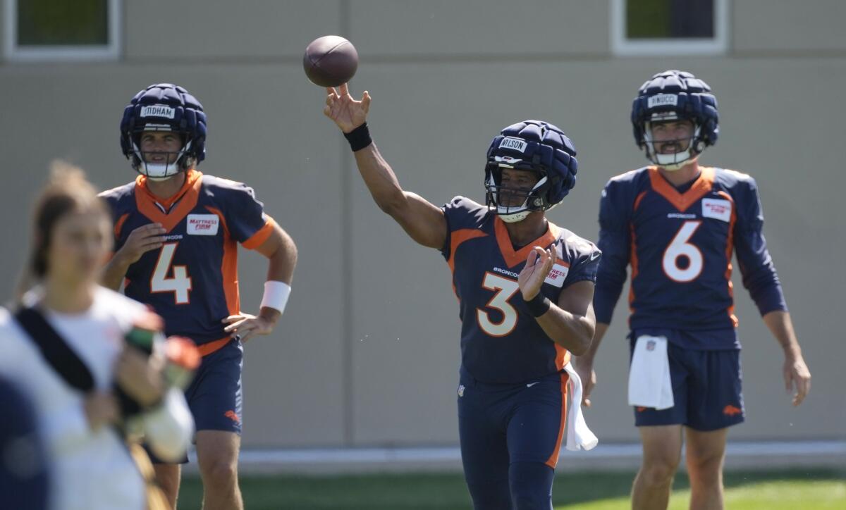 Russell Wilson Denver Broncos Autographed 16 x 20 Running Photograph