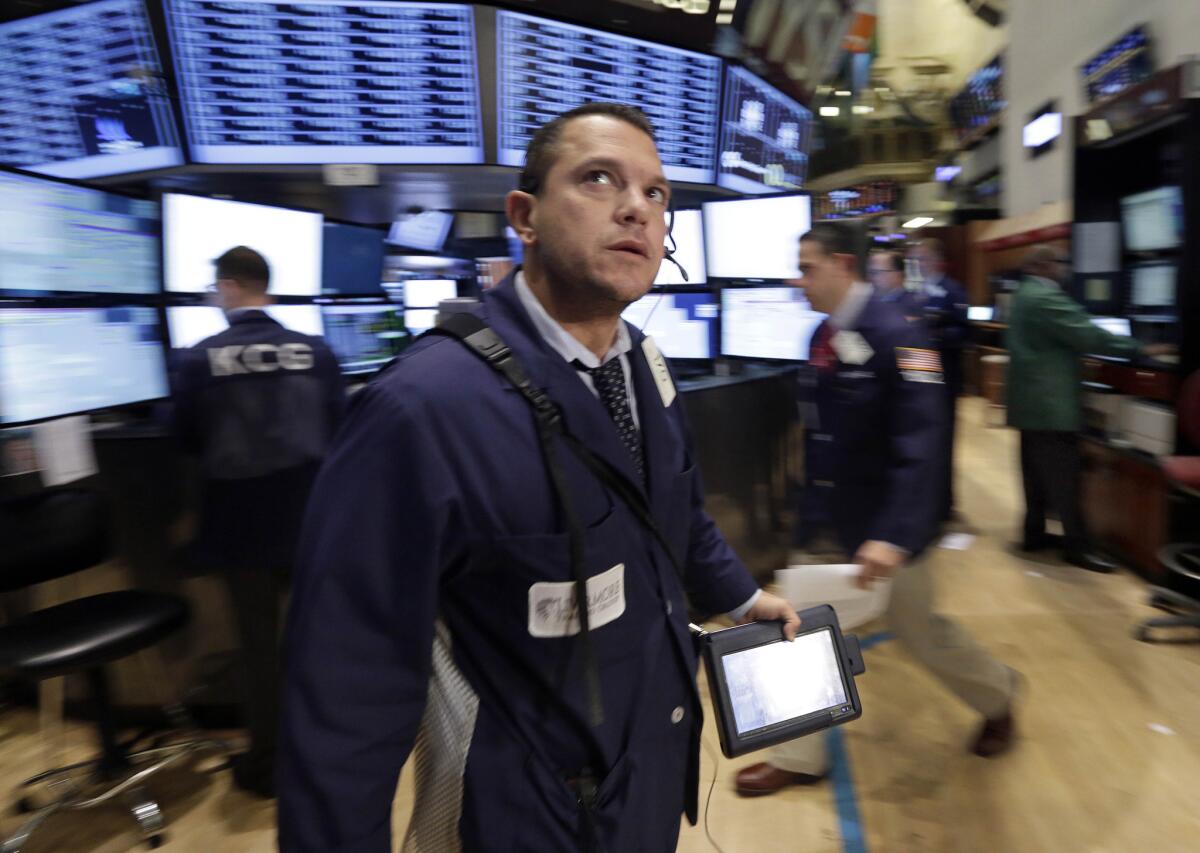 Trader Michael Zicchinolfi on the floor of the New York Stock Exchange on Tuesday.