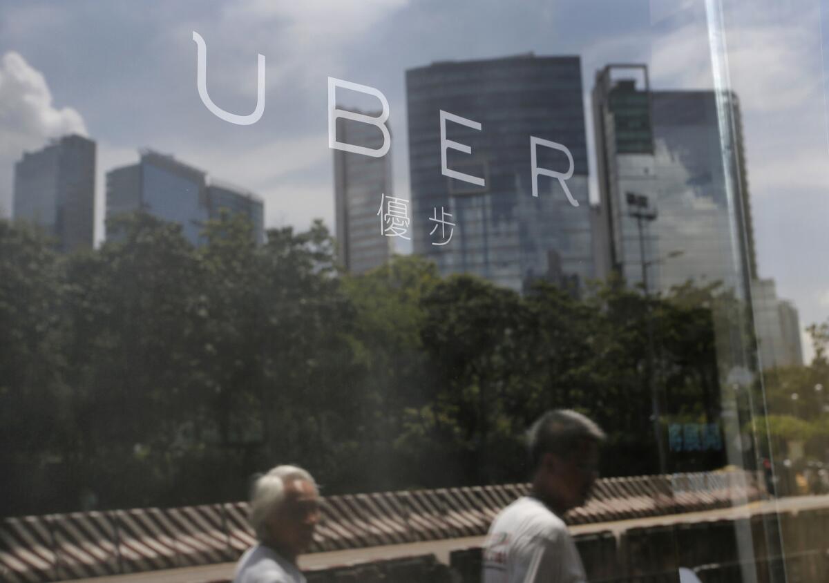 Companies such as ride-hailing app Uber raised more than $1 billion. Above, the start-up's office in Hong Kong.