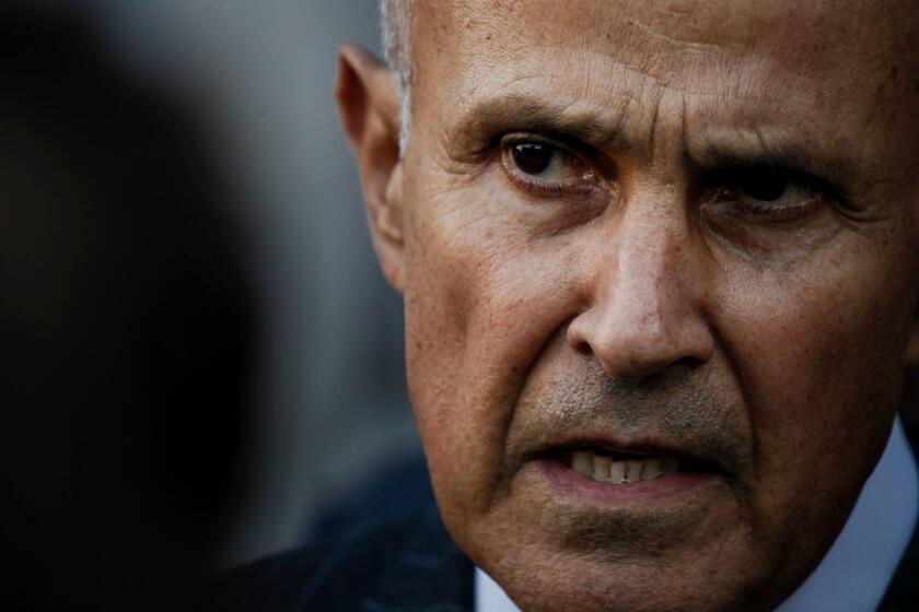 Former Los Angeles County Sheriff Lee Baca talks to reporters outside the federal courthouse earlier this week after his obstruction case ended in a mistrial, with jurors hopelessly deadlocked.