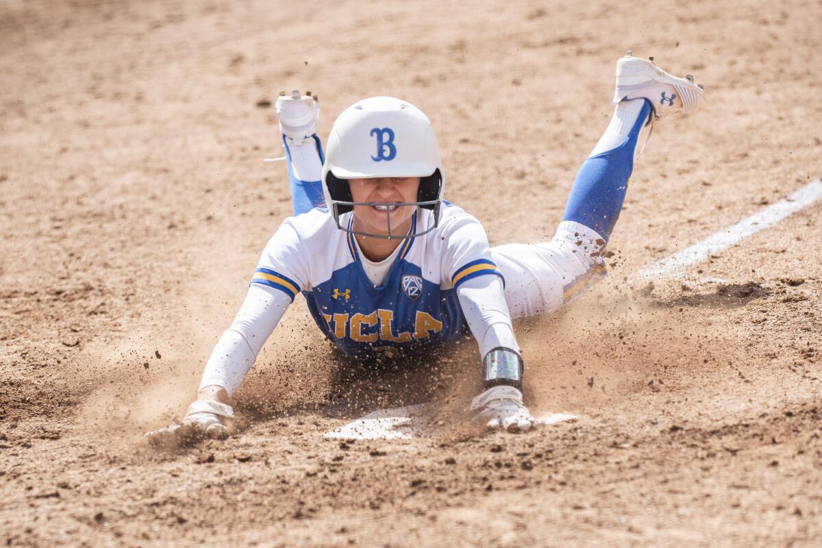 UCLA sophomore Briana Perez slides into home plate against Missouri on May 19. The Bruins defeated the Tigers 13-1 in the second game to advance to the NCAA Super Regionals.