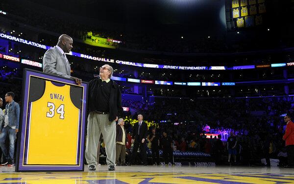 Actor Jack Nicholson joins former Laker Shaquille O'Neal during a ceremony to retire his number at the Staples Center Tuesday.