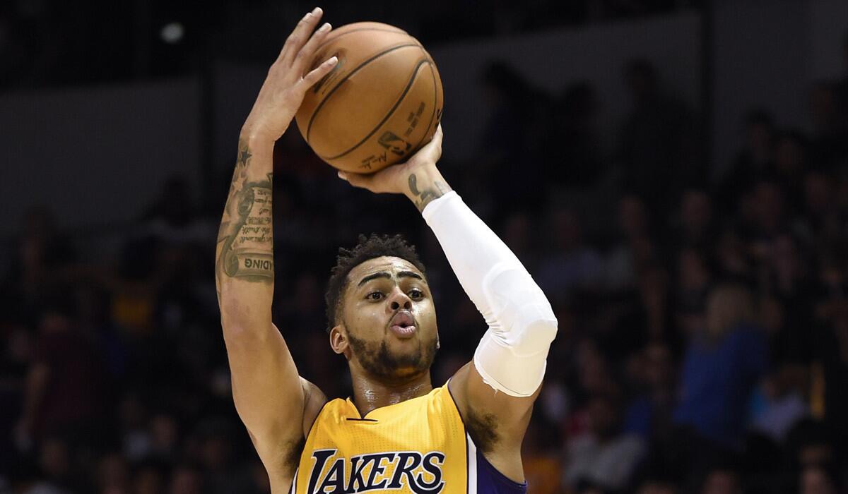 Lakers guard D'Angelo Russell takes a shot against Golden State on Oct. 19.