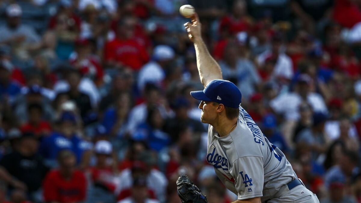 Los Angeles Dodgers pitcher Ross Stripling pitches against the Angels.