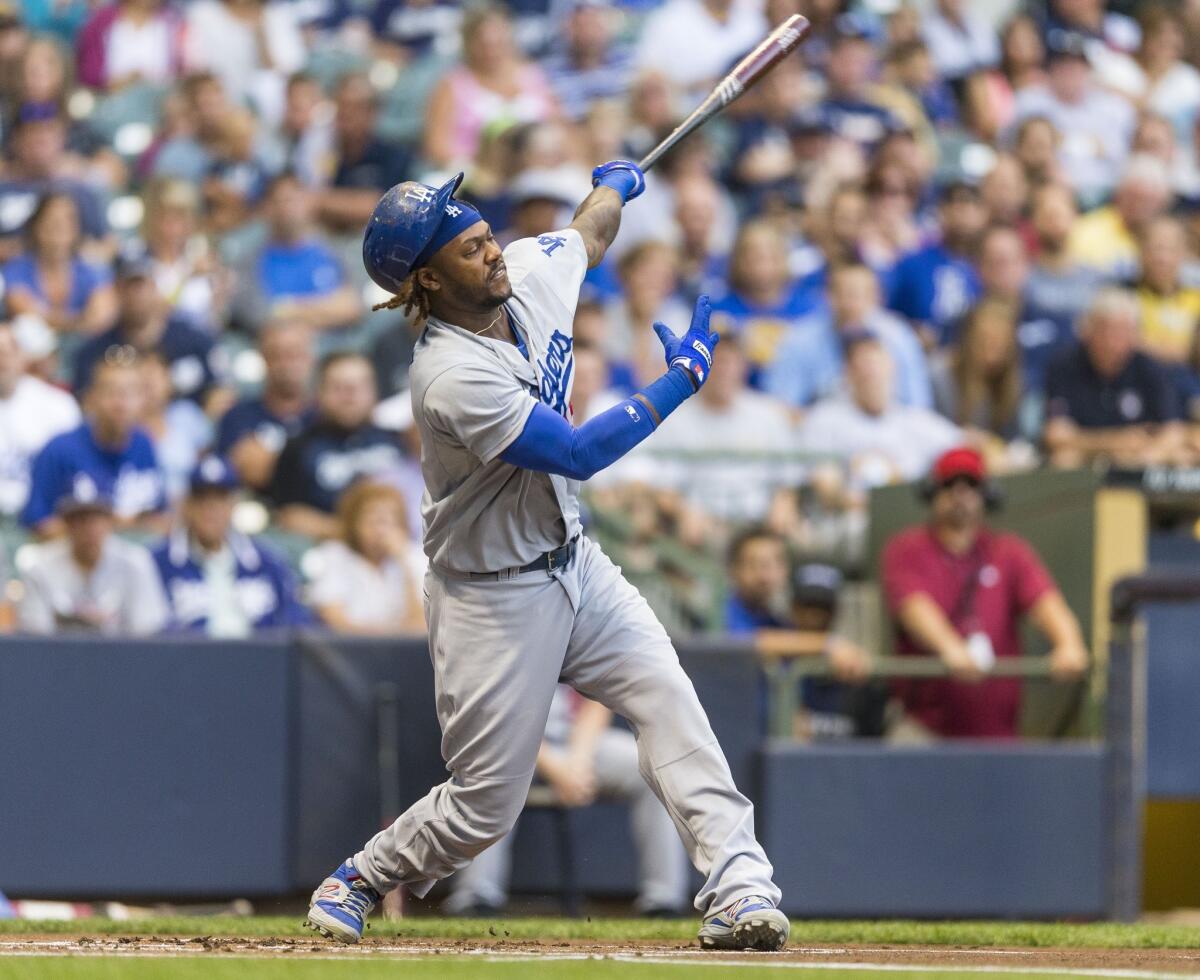 Hanley Ramirez was taken out of the Dodgers game against the Milwaukee Brewers at Miller Park on Friday because of "right side tightness."