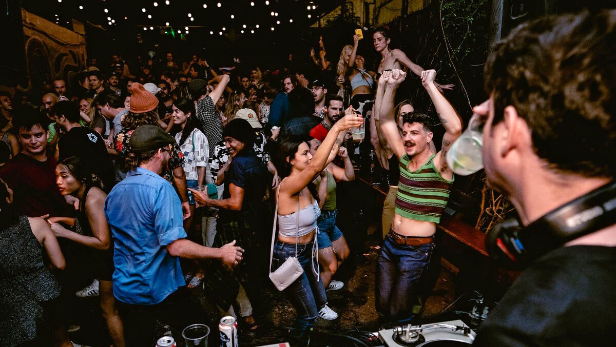 Crowd partying on the patio at Funky Sole.