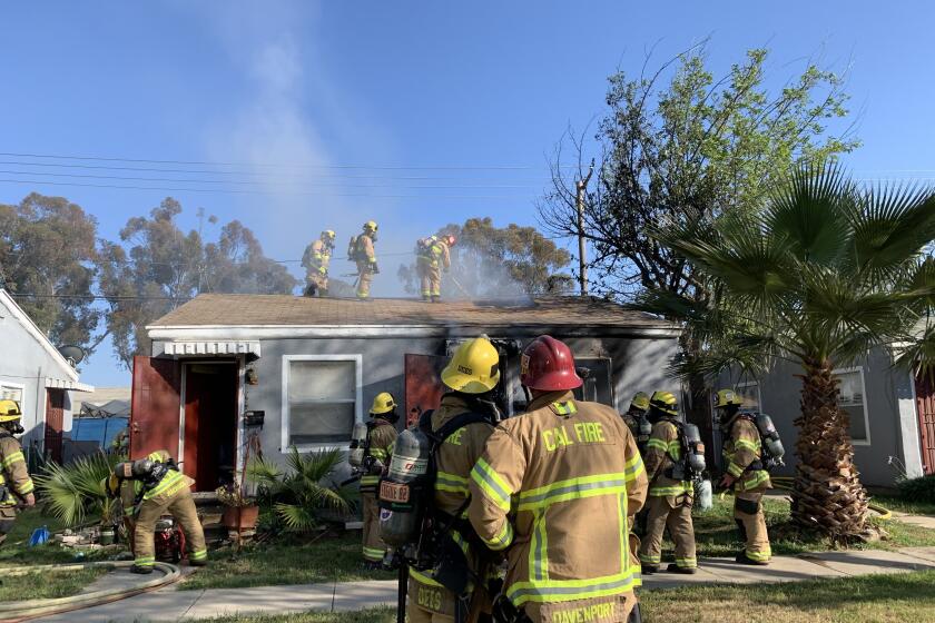 Firefighters extinguished a house fire on Main Street in Ramona on Sunday afternoon.