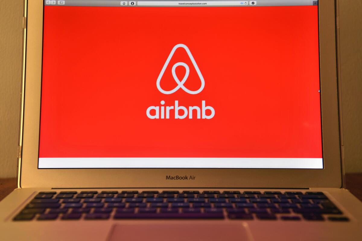 The Airbnb logo is displayed on a computer screen on Aug. 3, 2016.