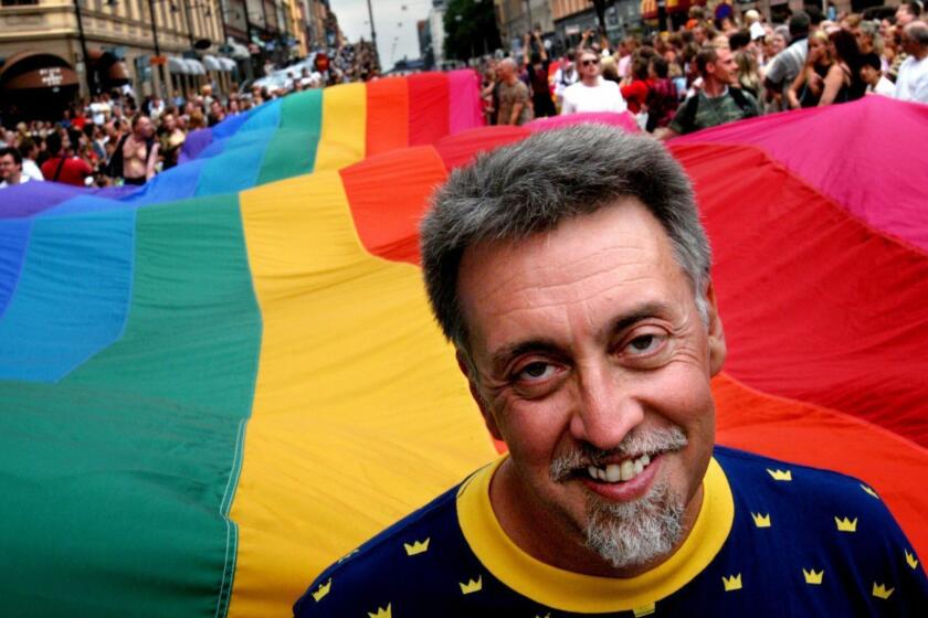 epa05881943 (FILE) - US artist and civil rights activist Gilbert Baker heads the Stockholm Pride Parade carrying a 250-meter long flag in Stockholm, Sweden, 02 August 2003 (reissued 01 April 2017). Gilbert Baker, known for creating the rainbow flag, a well-known lesbian, gay, bisexual, and transgender (LGBT) community symbol, has died at the age of 65, according to media reports on 31 March 2017. EPA/FREDRIK PERSSON SWEDEN OUT ** Usable by LA, CT and MoD ONLY **