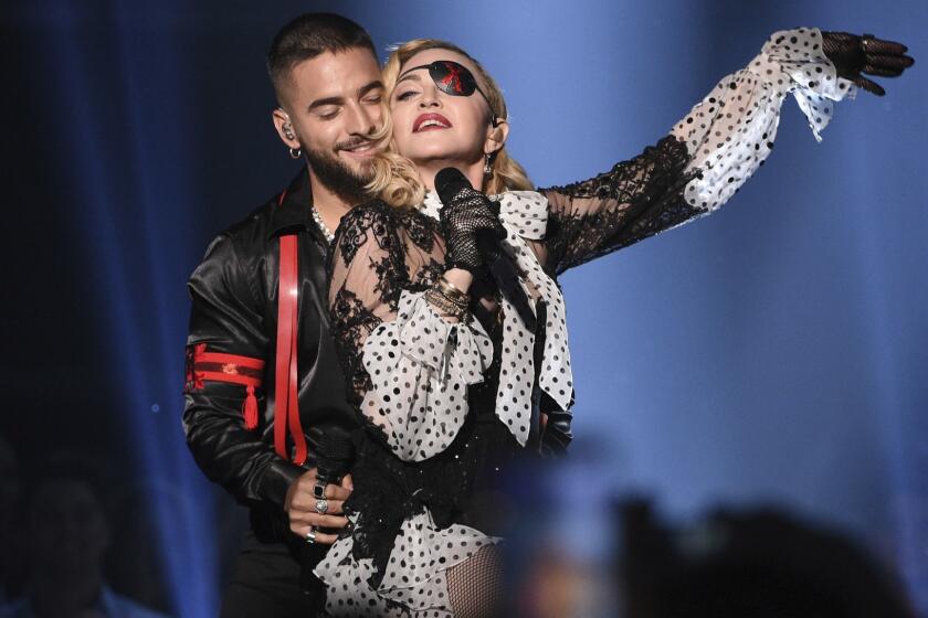 Maluma, left, and Madonna perform "Medellin" at the Billboard Music Awards on Wednesday, May 1, 2019, at the MGM Grand Garden Arena in Las Vegas. (Photo by Chris Pizzello/Invision/AP)