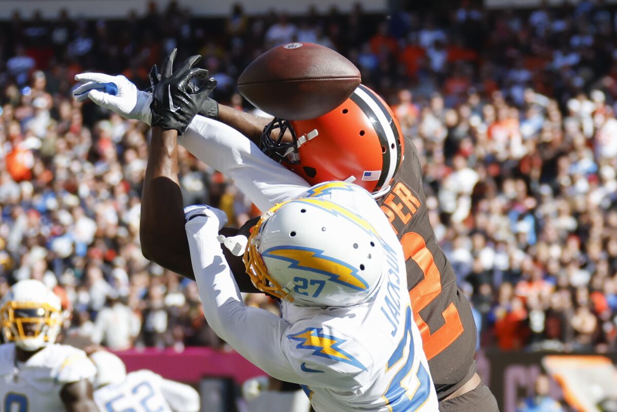  Chargers cornerback J.C. Jackson (27) breaks up a pass intended for Cleveland Browns wide receiver Amari Cooper.