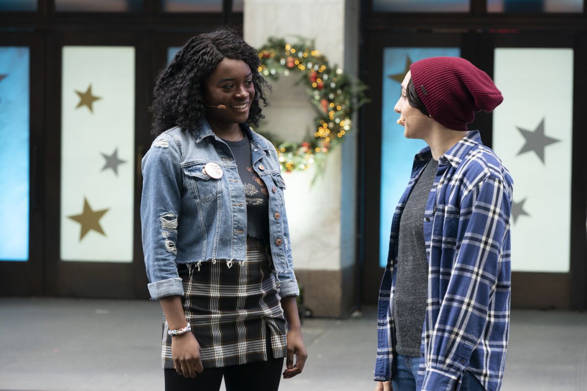 Celia Rose Gooding, left, and Lauren Patten perform a song from "Jagged Little Pill" in the parade.