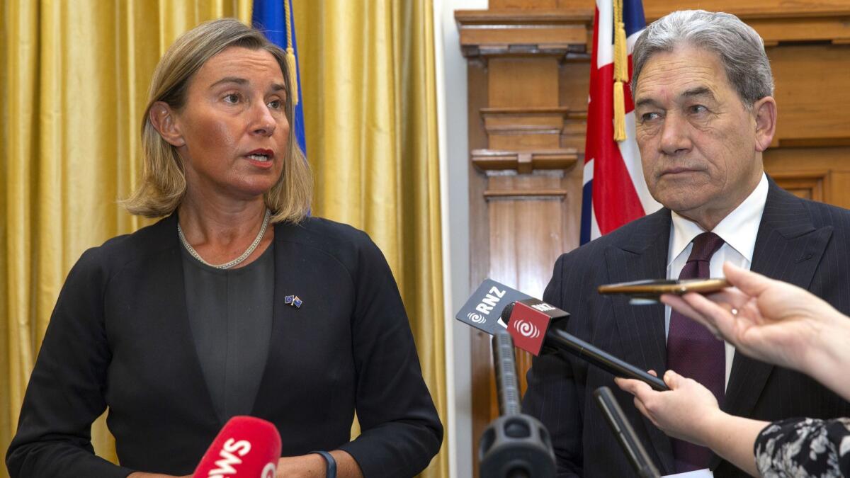 European Union foreign policy chief Federica Mogherini and New Zealand Foreign Minister Winston Peters address a news conference Aug. 7 after their meeting at Parliament in Wellington, New Zealand.