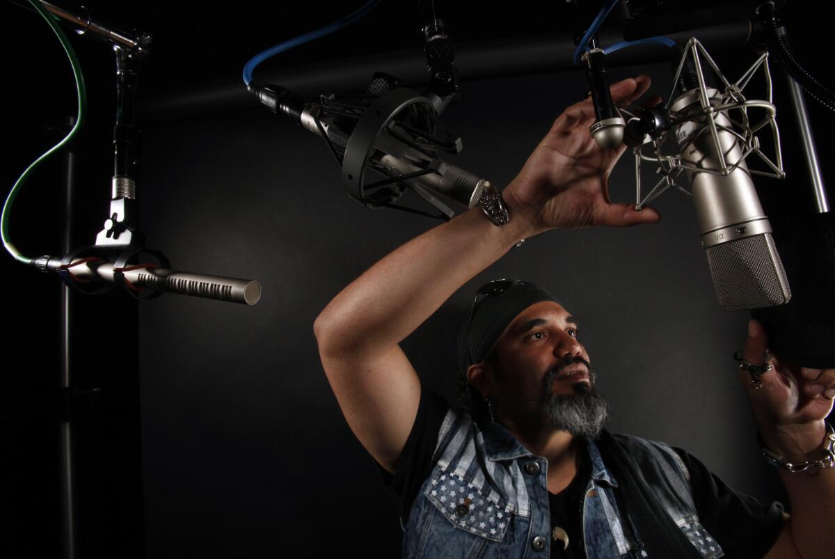 Christopher Navarro, an ADR mixer who worked on four of this year's nine Oscar-nominated best pictures, in his studio at Audio Head sound studios in West Hollywood.