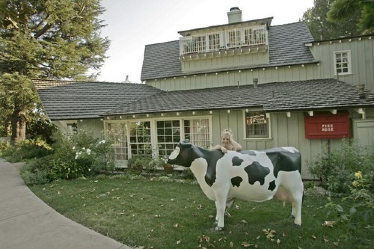 For Nancy Cartwright, the voice of Bart Simpson, home is a country-flavored retreat in Northridge. Standing sentinel outside her 1947 Connecticut-style farmhouse: a life-size fiberglass cow she named Milk Dud.