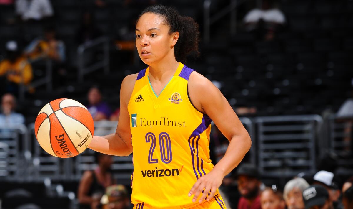 Sparks guard Kristi Toliver controls the ball during a game against the New York Liberty in June 2016.