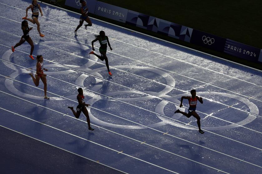 PARIS, FRANCE August 9, 2024-Women compete in the 400 meter final at the 2024 Paris Olympics Friday. (Skalij/Los Angeles Times)