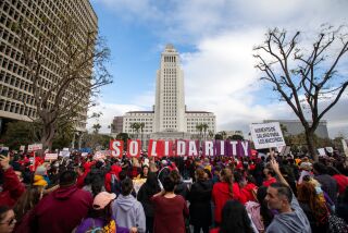  United Teachers of Los Angeles and SEIU 99 members hold a joint rally at Grand Park in a historic show of solidarity. 