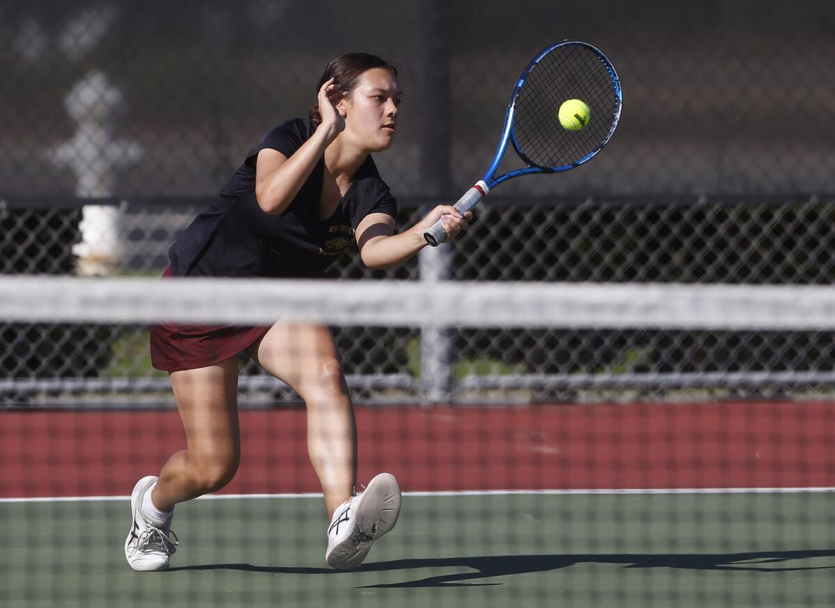 Estancia's Tara Spas runs to hit a forehand for a point against Costa Mesa on Tuesday.