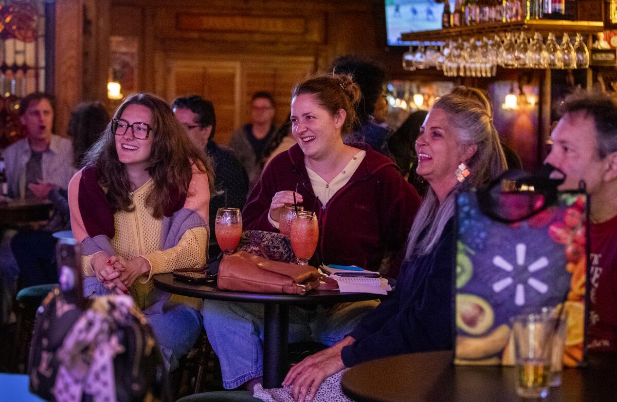 Audience members laugh at a comedian's joke during the open mic night at the Maui Sugar Mill Saloon in Tarzana.