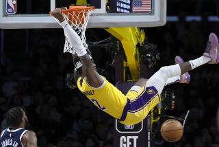 Lakers forward Jarred Vanderbilt dunks the ball in the second half.