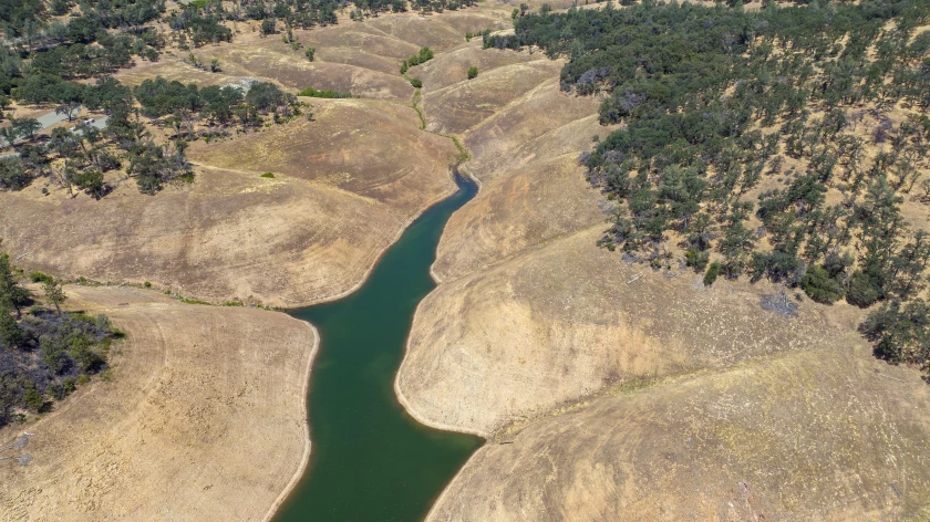 An aerial photo shows a shrinking Lake Oroville