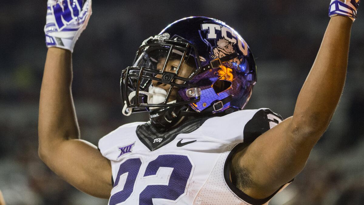 TCU tailback Aaron Green celebrates after scoring a touchdown during a win over Texas on Thursday.