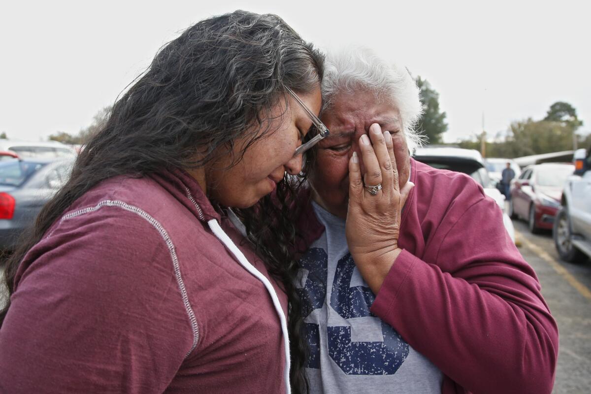 Tess Harjo, left, embraces grandmother Sally Taylor after being released from prison in Taft, Okla., on Monday.